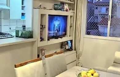 Imagem: O apartamento possui 2 Dormitórios, 1 Banheiro, 1 Vaga na garagem