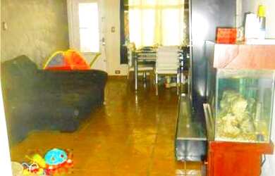 Imagem: A casa possui 3 Dormitórios, 2 Banheiros, 1 Vaga na garagem