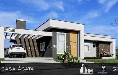 Imagem: A casa possui 3 Dormitórios, 3 Banheiros, 2 Vagas na garagem