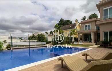 Imagem: A casa em condomínio possui 5 Dormitórios, 5 Banheiros, 3