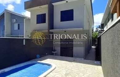 Imagem: A casa possui 3 Dormitórios, 3 Banheiros, 2 Vagas na garagem