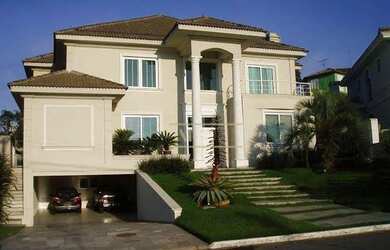 Imagem: A casa em condomínio possui 4 Dormitórios, 5 Banheiros, 5