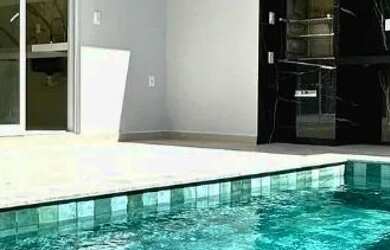 Imagem: A casa em condomínio possui 3 Dormitórios, 5 Banheiros, 4