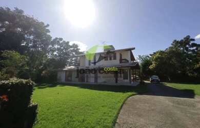 Imagem: A casa possui 3 Dormitórios, 3 Banheiros, 2 Vagas na garagem