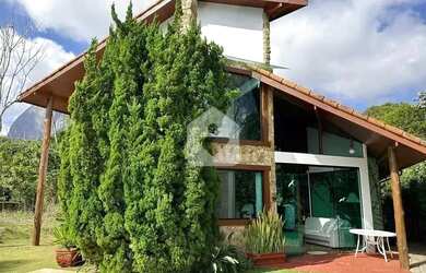 Imagem: A casa à venda possui 4 Dormitórios, 2 Banheiros, 2 Vagas