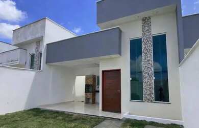 Imagem: A casa possui 3 Dormitórios, 2 Banheiros, 2 Vagas na garagem