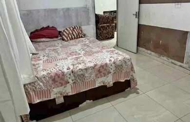 Imagem: A casa possui 2 Dormitórios e 1 Banheiro e está localizado