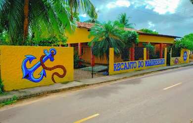 Imagem: A casa possui 3 Dormitórios, Acomodam 25 pessoas e 3 Vagas