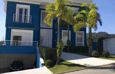 Imagem: A casa em condomínio possui 4 Dormitórios, 5 Banheiros, 4