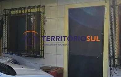 Imagem: A casa à venda possui 2 Dormitórios, 2 Banheiros, 1 Vaga na