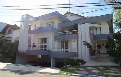 Imagem: A casa em condomínio possui 5 Dormitórios, 5 Banheiros, 5