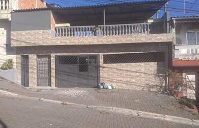 Imagem: A casa possui 2 Dormitórios, 1 Banheiro, 2 Vagas na garagem