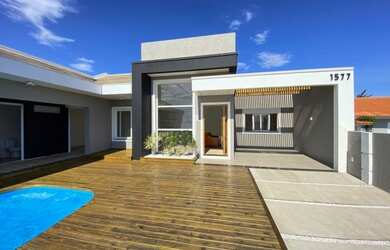 Imagem 2: Belíssima casa no centro de Imbé com piscina e área gourmet