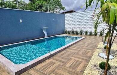 Imagem: A casa possui 4 Dormitórios, 3 Banheiros, 2 Vagas na garagem