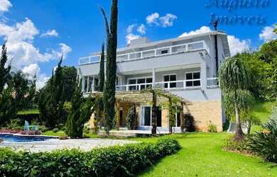 Imagem: A casa em condomínio possui 4 Dormitórios, 5 Banheiros, 4