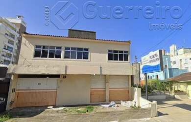 Imagem: A casa possui 3 Dormitórios, 3 Banheiros, 3 Vagas na garagem