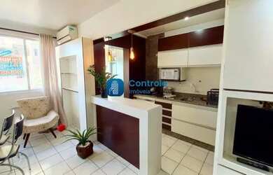 Imagem: O apartamento possui 2 Dormitórios, 1 Banheiro, 1 Vaga na garagem