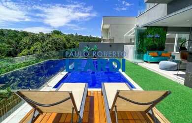 Imagem: A casa em condomínio possui 4 Dormitórios, 5 Banheiros, 4