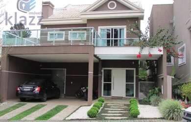 Imagem: A casa em condomínio possui 3 Dormitórios, 4 Vagas na garagem