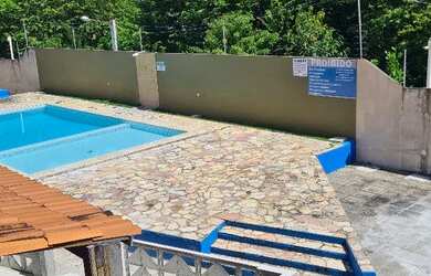 Imagem: A casa possui 3 Dormitórios, 1 Vaga na garagem e está localizado