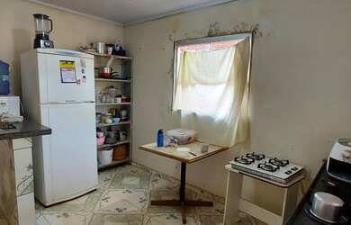 Imagem: A casa possui 2 Dormitórios, 1 Banheiro, 5 Vagas na garagem