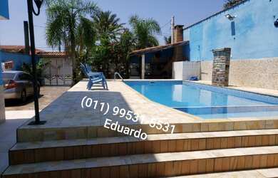 Imagem: A casa possui 5 Dormitórios, 3 Vagas na garagem e Imóvel novo