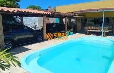 Imagem: A casa possui 2 Dormitórios, 3 Banheiros, 2 Vagas na garagem