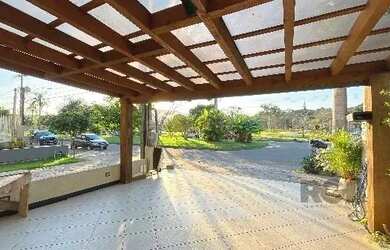 Imagem 4: Casa em Porto Alegre, no bairro Hípica, com 3 dormitório s , e 3 banheiros,...