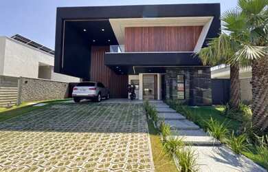 Imagem: A casa em condomínio possui 4 Dormitórios, 4 Banheiros, 4