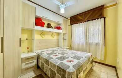 Imagem: O apartamento possui 2 Dormitórios, 1 Banheiro, 1 Vaga na garagem