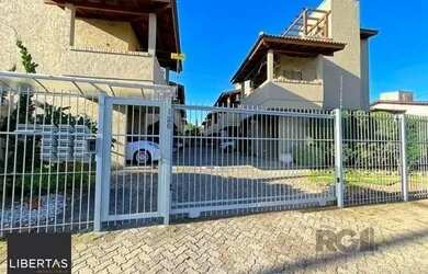 Imagem: A casa em condomínio possui 2 Dormitórios, 2 Banheiros, 1