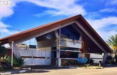 Imagem: A casa possui 3 Dormitórios, 4 Banheiros, 4 Vagas na garagem