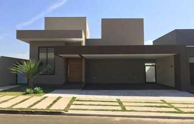 Imagem: A casa possui 3 Dormitórios, 4 Banheiros, 3 Vagas na garagem