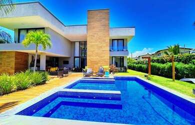 Imagem: A casa em condomínio possui 5 Dormitórios, 5 Banheiros, 2