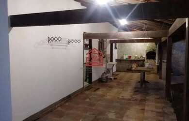 Imagem: A casa possui 3 Dormitórios, 3 Banheiros, 5 Vagas na garagem