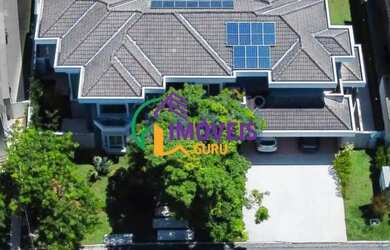 Imagem: A casa em condomínio à venda possui 4 Dormitórios, 4 Banheiros