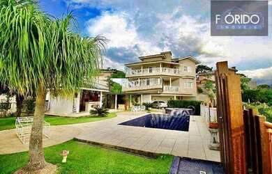 Imagem: A casa em condomínio possui 4 Dormitórios, 5 Banheiros, 5