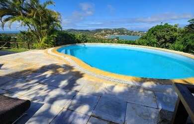 Imagem: A casa em condomínio possui 4 Dormitórios, 5 Banheiros, 3