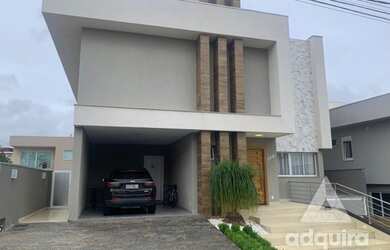 Imagem: A casa em condomínio possui 4 Dormitórios, 3 Banheiros, 5