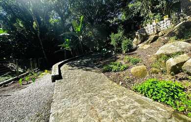 Imagem: A casa em condomínio possui 5 Dormitórios, 5 Banheiros, 5