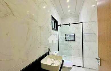 Imagem: A casa possui 3 Dormitórios, 4 Banheiros, 4 Vagas na garagem