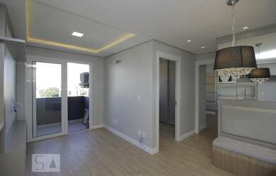 Imagem: O apartamento possui 2 Dormitórios, 1 Banheiro, 1 Vaga na garagem