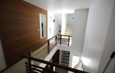 Imagem: A casa possui 4 Dormitórios, 4 Vagas na garagem e está localizado