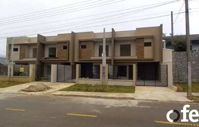 Imagem: A casa possui 3 Dormitórios, 2 Banheiros, 1 Vaga na garagem