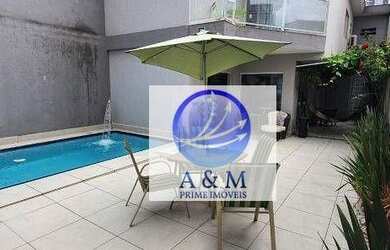 Imagem: A casa possui 3 Dormitórios, 5 Banheiros, 4 Vagas na garagem