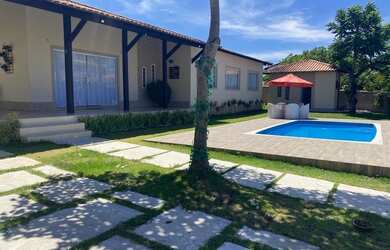 Imagem: A casa possui 5 Dormitórios, 5 Banheiros, 5 Vagas na garagem