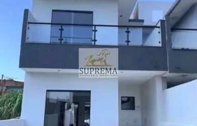 Imagem: A casa possui 2 Dormitórios, 2 Banheiros, 2 Vagas na garagem