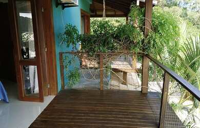 Imagem: A casa possui 2 Dormitórios, 2 Vagas na garagem e está localizado