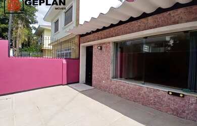 Imagem: A casa possui 3 Dormitórios, 5 Banheiros, 2 Vagas na garagem