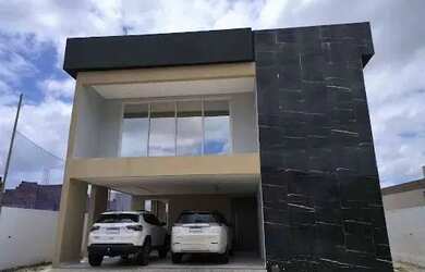Imagem: A casa possui 5 Dormitórios, 5 Banheiros, 4 Vagas na garagem
